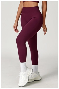 Detail of wine red seamless yoga leggings and top with squat-proof matte texture