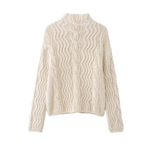Creamy white Fair Isle wool sweater with chunky cable knit texture and high neck design