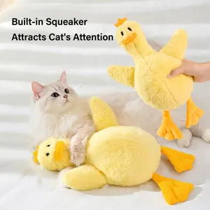 Plush yellow duck cat toy with internal squeaker for interactive pet play and chewing