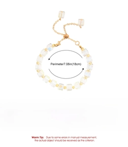 Detail of adjustable beaded bracelet with iridescent stones and gold metal chain