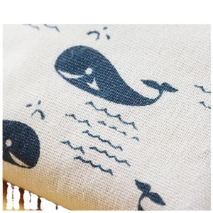 Minimalist linen canvas coin purse with blue whale print and decorative tassel edge