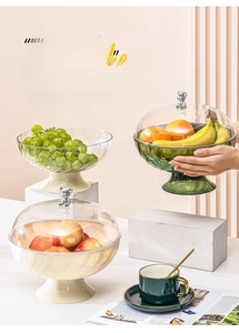 Detail of luxury tiered fruit tray with bear handle lid and stylish striped texture