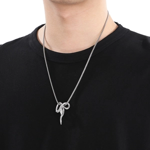 Punk vintage snake pendant necklace in silver titanium steel worn by a model