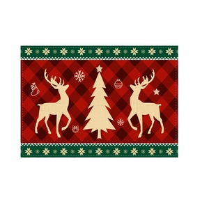 Christmas place mat with red black plaid pattern featuring reindeer and pine tree motif