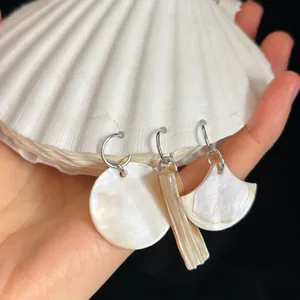 Three-piece set of natural shell earrings in round, bar, and fan shapes with silver hoops