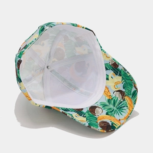 Detail of tropical banana print baseball cap showing inner mesh lining and sweatband