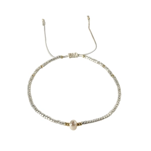 Handmade beaded bracelet with silver Miyuki beads, a central pearl, and adjustable white cord