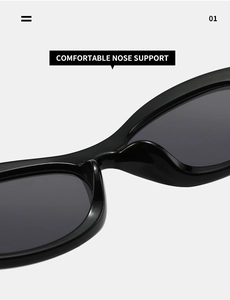 Detail of comfortable integrated nose support on oval glossy black sunglasses
