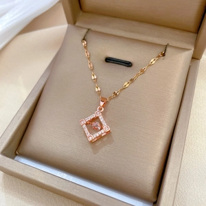 Elegant rose gold square pendant necklace with pink crystal and diamond pavé in a gift box