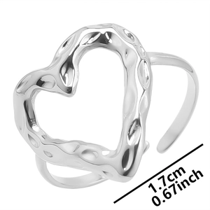 Detail view of heart-shaped silver ring with hammer texture finish showing 1.7cm width