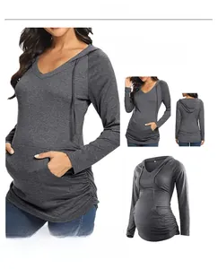 Detail view of dark grey maternity hoodie with V-neck, side ruching and front pocket
