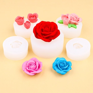 Various sizes of 3D rose flower silicone molds with multi-colored floral soap samples