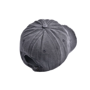 Detailed back view of distressed dark grey baseball cap showing metal buckle and worn edges