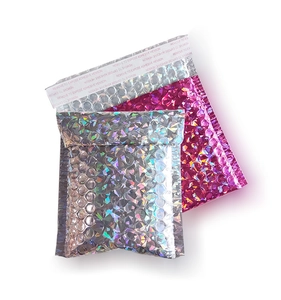 Detailed macro view of laser bubble envelopes with holographic finish and strong adhesive strip