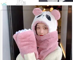 Detail of pink and white plush panda hat scarf combo with cute 3D embroidery and paws