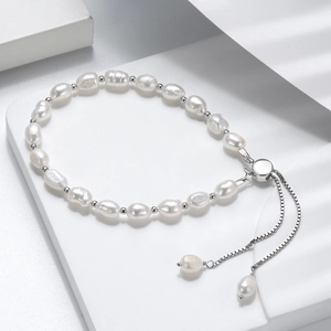 Detail of s925 silver pearl bracelet with baroque freshwater pearls and adjustable slide clasp
