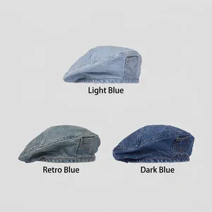 Three denim beret painter hats in light blue, vintage blue and dark blue with small pockets