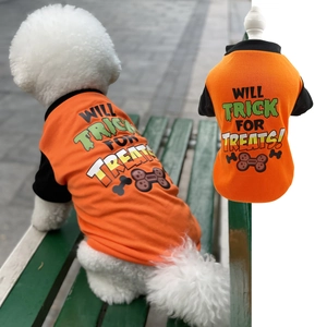 Detail of orange Halloween pet t-shirt with Will Trick For Treats print on cotton fabric