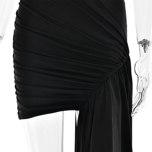 Detail of black slim fit dress featuring ruched elastic fabric and asymmetric ribbon ties