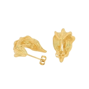 Detail view of gold stainless steel earrings with irregular crushed texture and leaf design