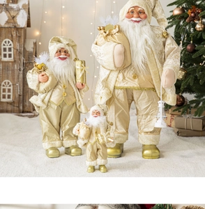 Three sizes of Santa Claus dolls in luxury gold and cream outfits for Christmas decor