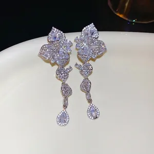 Elegant cubic zirconia leaf earrings with water drop tassels in a silver finish