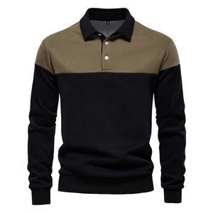 Close-up of long-sleeve polo shirt showing cotton texture and black-khaki color block