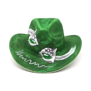 Detail of green felt cowboy hat with silver hand-painted eye patterns and artistic script
