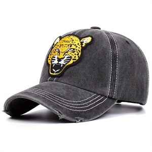 Washed dark grey baseball cap featuring a yellow leopard head embroidery and distressed brim