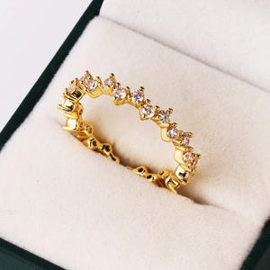 Elegant gold-plated geometric ring featuring sparkling clear zircons in a jewelry box