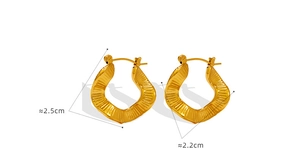 Detail view of irregular wavy gold hoop earrings showing size dimensions 2.5cm by 2.2cm