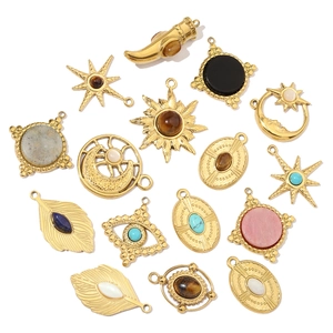 Vintage celestial stainless steel pendants with natural stones like turquoise and tiger eye
