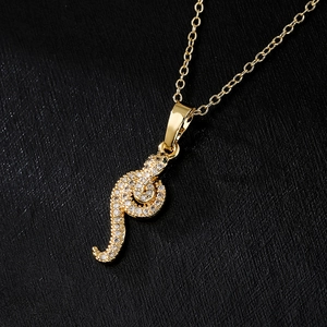 18K gold plated copper snake pendant necklace with shimmering cubic zirconia stones