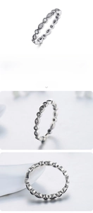 Macro detail of S925 sterling silver eternity ring with 0.26cm width and 1.4g weight