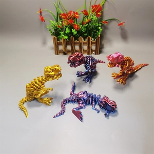 Set of 3D printed dinosaur skeletons with movable joints in gold and gradient colors