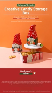 Detail of Christmas tin box with gnome design for festive candy and cookie storage