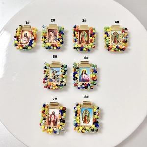 Handmade religious saint charms with gold square frames and colorful beads for DIY jewelry