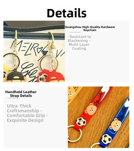 Detailed view of the golden metal clasp and leather strap for a soccer boy keychain
