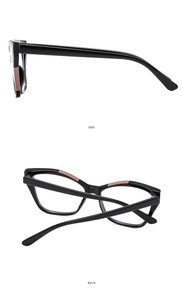 Detail view of cat-eye frames with gold top bar, showing side and back perspectives