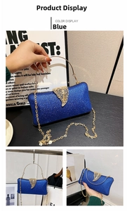 Detail of blue sequin evening clutch with gold leaf clasp and circular metal handle