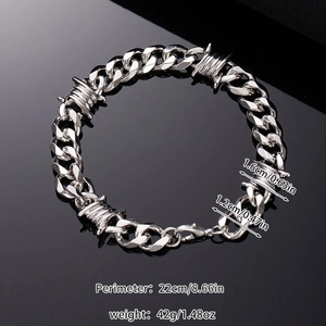 Detailed view of silver Cuban link chain with dimensions 22cm length and 1.6cm thickness