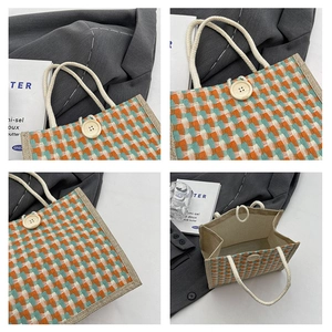 Detail view of woven linen tote bag featuring rope handles and magnetic closure