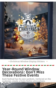 Close-up of Merry Christmas window decal with gold stars and reindeer on glass