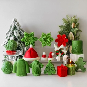 Detailed collection of Christmas scented candles including trees, hats, and gingerbread men