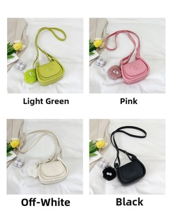 Mini crossbody bags for girls in four colors with cute girl pattern and pom pom charms