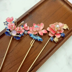 Three-piece Chinese style floral hairpins with pink enamel petals and pearl tassels
