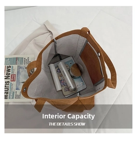 Large capacity corduroy tote bag showing internal storage for phone and cosmetics