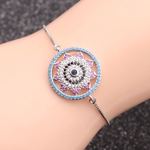 Silver Evil Eye bracelet for men featuring colorful stones on a black shimmering background