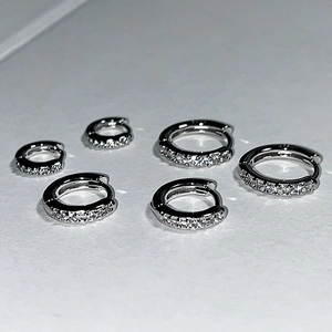 Sparkling S925 sterling silver huggie earrings set with dense pavé zircon stones