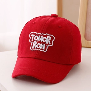 Close-up of TOMORROW embroidery on red cotton baseball cap with six-panel structure
